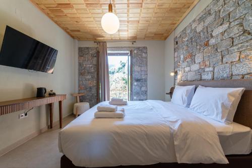 Postel nebo postele na pokoji v ubytování Aeriko Guest House