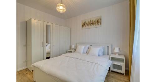 Postel nebo postele na pokoji v ubytování Zen Flat - 5 min Metrou