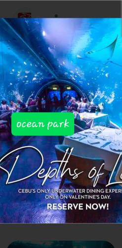 a sign for an aquarium with a picture of the ocean part at Two-Bedroom at San Remo Oasis in Cebu City