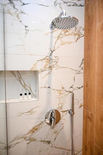 Un baño de Hotel Vila AARON