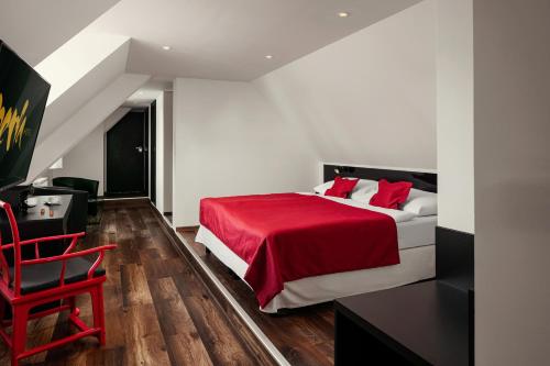 Postel nebo postele na pokoji v ubytování Perla Hotel
