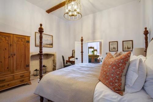 Ένα ή περισσότερα κρεβάτια σε δωμάτιο στο Gatehouse East