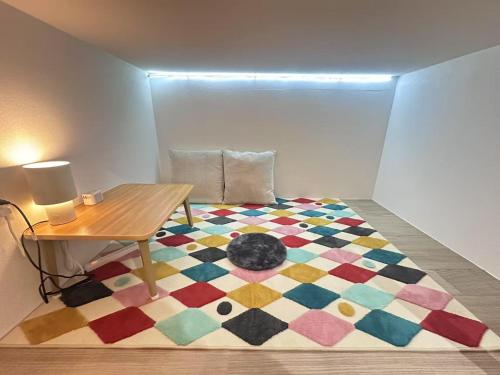 Ένα ή περισσότερα κρεβάτια σε δωμάτιο στο Cozey Retreat Waffle Women's Hostel Women Only