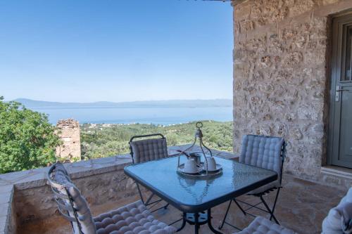 Niki's Tower - Serene Seaview Stone Getaway
