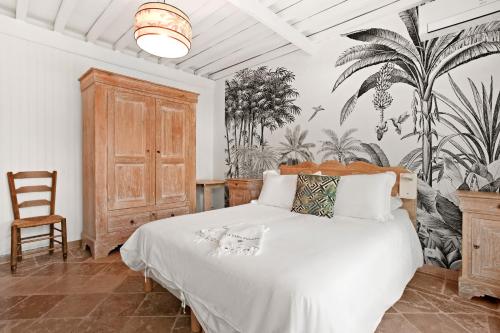 Postel nebo postele na pokoji v ubytování Villa Paradis
