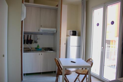 Residence Rosaにあるキッチンまたは簡易キッチン