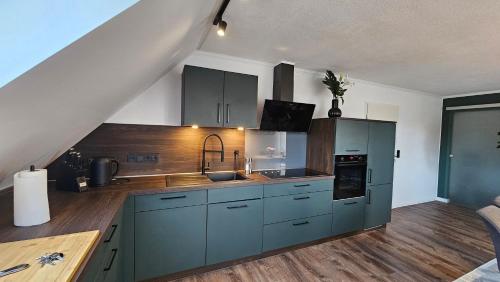 Cucina o angolo cottura di Ferienwohnung "Friesentied" 35229