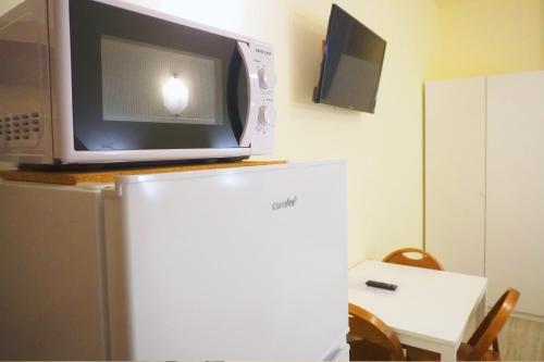 Residence Rosaにあるキッチンまたは簡易キッチン