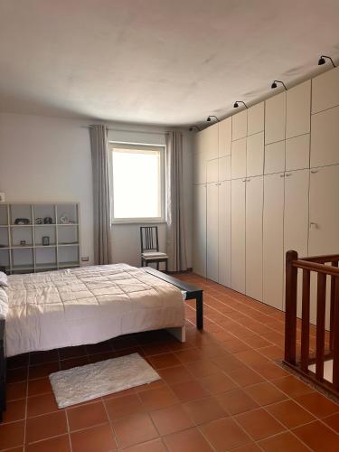 Katil atau katil-katil dalam bilik di Casa Soma, mare e borgo