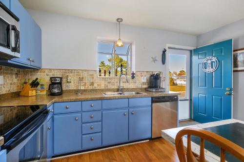Η κουζίνα ή μικρή κουζίνα στο Oyster Bay Hideaway