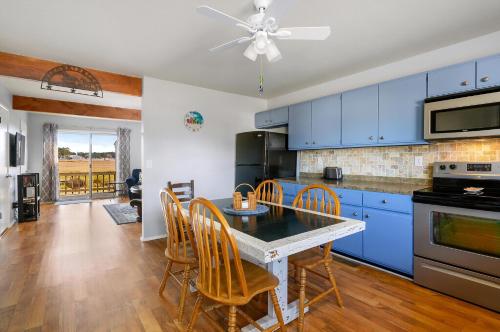 Η κουζίνα ή μικρή κουζίνα στο Oyster Bay Hideaway