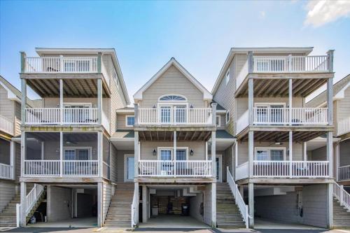 a row of apartment buildings with balconies at Water's Edge in Chincoteague