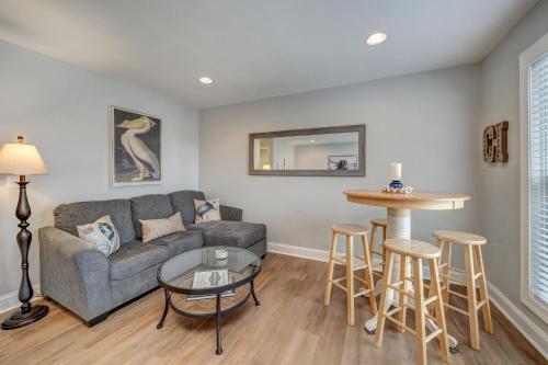a living room with a couch and a table at Eventide in Black Point Landing