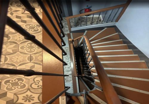 a staircase in a home with tile floors at Paris Rooms & Dreams Hotel in Paris