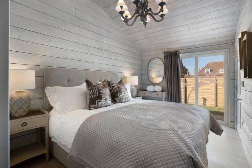 Postel nebo postele na pokoji v ubytování Orchard Cottage