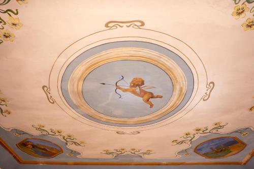 a painting of a teddy bear on a ceiling at Villa Amoroso - Ospitalità Mediterranea in Agrigento