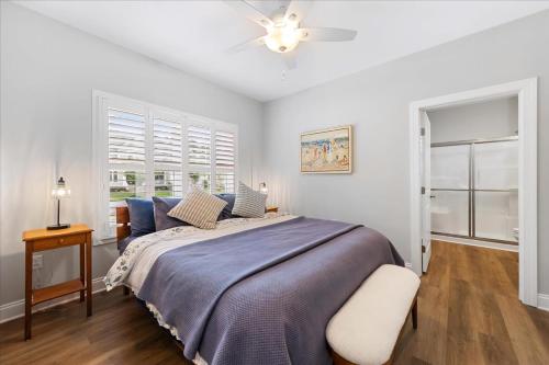 a bedroom with a bed and a ceiling fan at 116 Pine Forest Drive in Ocean Pines