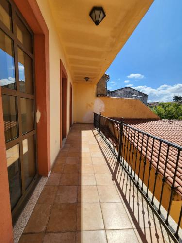 a balcony with a view of a building at Jayca in Trujillo