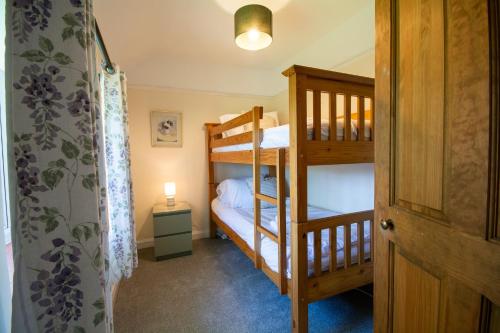 Postel nebo postele na pokoji v ubytování Tanllyn