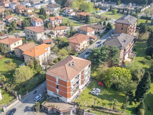 an aerial view of a residential neighbourhood with a building at Blue Dream in Ispra
