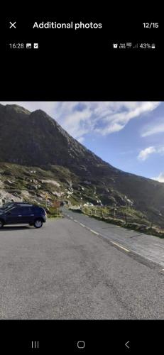 a picture of a car driving down a road at Beautiful Mobile Home in Tralee