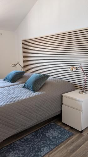 Postel nebo postele na pokoji v ubytování Lederkappe Apartments