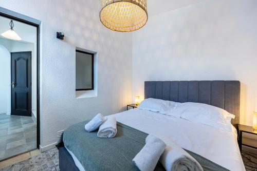 Postel nebo postele na pokoji v ubytování Casa Emma