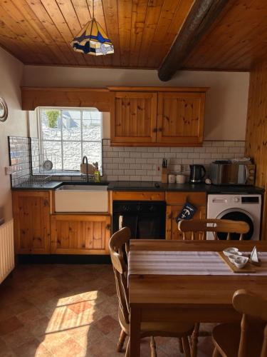 Köök või kööginurk majutusasutuses Lighthouse Keepers Cottage