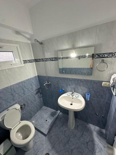 Koupelna v ubytování Nevi Rooms