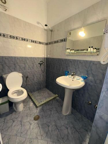 Koupelna v ubytování Nevi Rooms