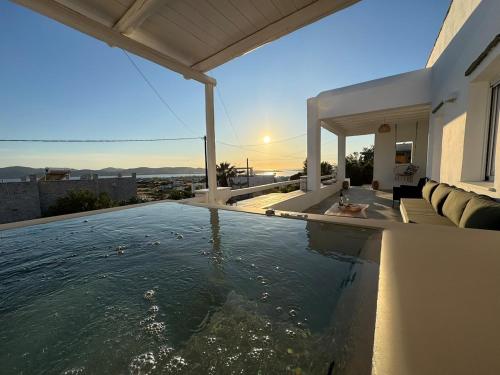 a swimming pool in a house with a view at La vie est belle luxury apartment BBQ jacuzzi&view in Pounda