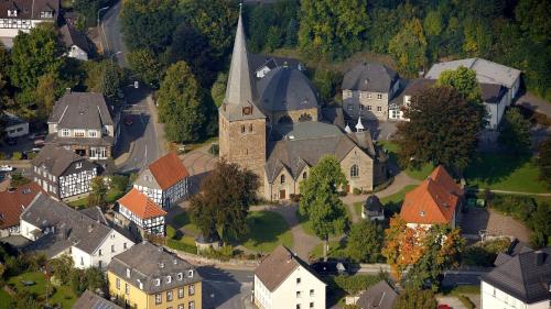 an aerial view of a small town with a church at Apartment Ballova in Balve