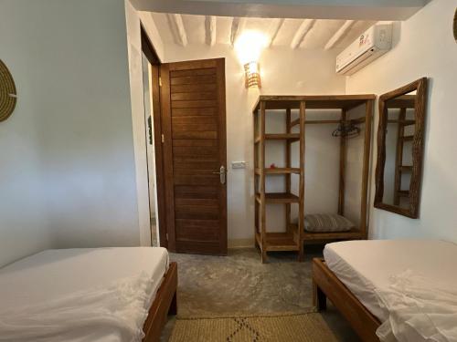 Katil atau katil-katil dalam bilik di Breeze Residence