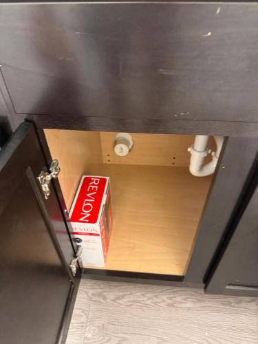 a box sitting on top of a drawer in a room at Leander Gem Near Austin in Leander