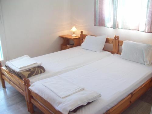 Katil atau katil-katil dalam bilik di Villa Vania
