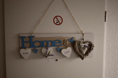 Chứng chỉ, giải thưởng, bảng hiệu hoặc các tài liệu khác trưng bày tại Ferienwohnung Windhund