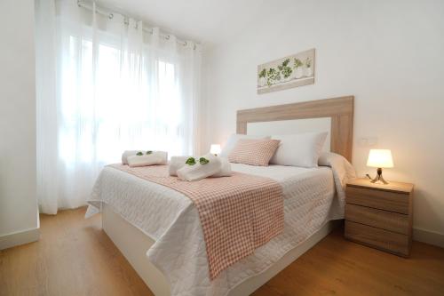 GALIHOST - Apartamentos con parking frente a la playa