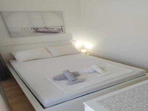 Ένα ή περισσότερα κρεβάτια σε δωμάτιο στο Apartment Leo Povile
