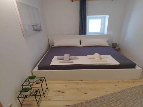 Ένα ή περισσότερα κρεβάτια σε δωμάτιο στο Apartment Leo Povile
