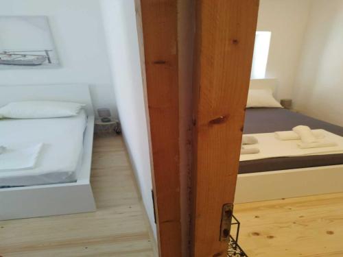 Ένα ή περισσότερα κρεβάτια σε δωμάτιο στο Apartment Leo Povile