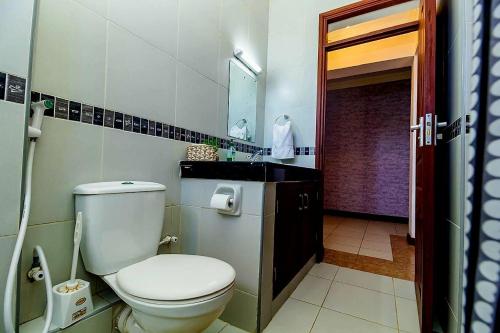 Ένα μπάνιο στο Zuri Holiday Apartments