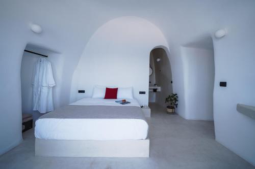 Ein Bett oder Betten in einem Zimmer der Unterkunft Santonero