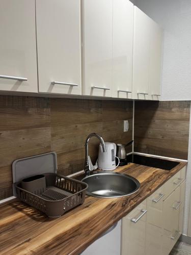 Kuchyň nebo kuchyňský kout v ubytování Sunflower Apartmani