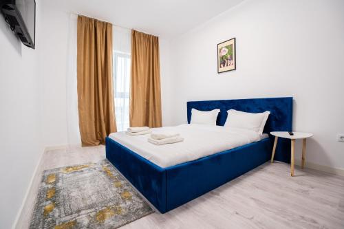 Postel nebo postele na pokoji v ubytování Real Resort
