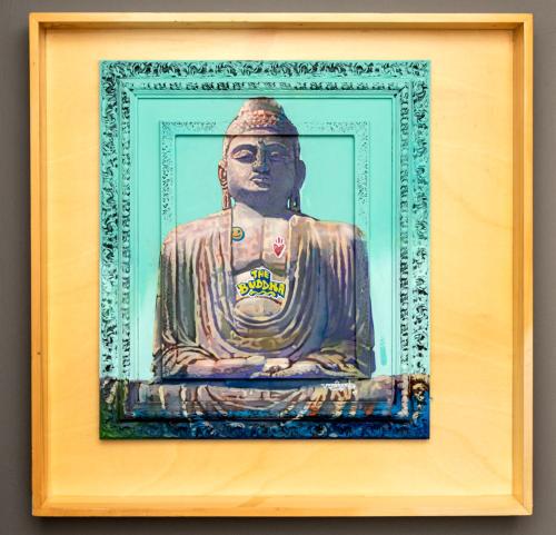 a picture of a statue in a wooden frame at Rise Urban Art Hotel in Larnaka