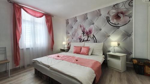 Katil atau katil-katil dalam bilik di Villa Napsugár
