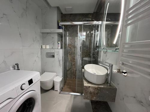 Koupelna v ubytování Modern Family Nest SKG