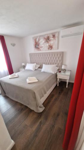 Postel nebo postele na pokoji v ubytování Apartments Ante 1