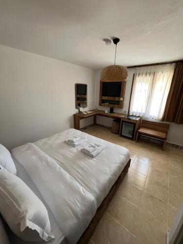 Postel nebo postele na pokoji v ubytování kai urla