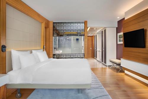 Телевизор и/или развлекательный центр в The Grand Tarabya Managed by Accor